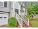 Inviting front entrance with decorative door and manicured shrubbery at 4917 Baker Ridge Pl, Acworth, GA 30101
