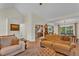 Cozy living room with a view to kitchen and dining at 4917 Baker Ridge Pl, Acworth, GA 30101