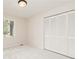 Bright bedroom with fresh paint, soft carpet, and large closet doors for ample storage at 5819 Stonehaven Nw Dr, Kennesaw, GA 30152