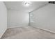 New bedroom includes a window, providing a simple yet inviting space at 104 Marlow Dr, Woodstock, GA 30188