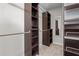 Walk in closet features custom shelving to maximize storage space at 104 Marlow Dr, Woodstock, GA 30188
