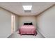 Simple bedroom featuring a bed, neutral colored carpet and walls, providing a relaxing retreat at 1058 Magnolia Dr, Villa Rica, GA 30180