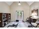 Bright bonus room with French doors, tall ceilings, and custom shelving at 1058 Magnolia Dr, Villa Rica, GA 30180