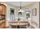 Cozy breakfast nook with hardwood floors and plenty of natural light at 1058 Magnolia Dr, Villa Rica, GA 30180