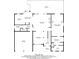 This floor plan features a kitchen, living room, primary bedroom, and a garage at 1058 Magnolia Dr, Villa Rica, GA 30180