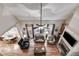 Open-concept living room featuring a fireplace, hardwood floors, and great natural light at 1058 Magnolia Dr, Villa Rica, GA 30180