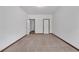 Spacious bedroom with neutral carpet and trim at 5589 Dendy Trc, Fairburn, GA 30213