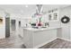 Modern kitchen featuring quartz countertops, white cabinets, and stainless steel appliances at 750 Southland Pass, Stone Mountain, GA 30087