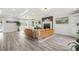 Spacious living room with coffered ceilings, modern fireplace, built-ins, and ample natural light at 750 Southland Pass, Stone Mountain, GA 30087