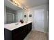 Bathroom features a double sink vanity, tile flooring, and a separate shower at 2333 Castle Keep Way, Atlanta, GA 30316