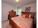 Bedroom features a queen bed, carpeted floors, natural light, and decor at 2333 Castle Keep Way, Atlanta, GA 30316