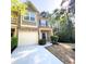 Two-story townhome boasting a well-maintained lawn and inviting curb appeal at 2333 Castle Keep Way, Atlanta, GA 30316