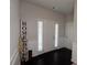 Bright entryway featuring wood flooring and decorative 'HOME' sign at 2333 Castle Keep Way, Atlanta, GA 30316