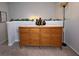 Hallway with dresser with six drawers, decor, and carpeted floor at 2333 Castle Keep Way, Atlanta, GA 30316