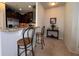 Stylish kitchen with stainless steel appliances, granite counters, and bar seating at 2333 Castle Keep Way, Atlanta, GA 30316
