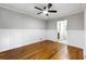 Bedroom features hardwood floors and decorative wainscotting at 2461 Antwerp Se Dr, Atlanta, GA 30315