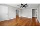 Bright living room featuring hardwood floors, neutral paint, and a modern ceiling fan at 2461 Antwerp Se Dr, Atlanta, GA 30315