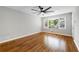 Comfortable living room featuring hardwood floors, neutral paint and large windows for natural light at 2461 Antwerp Se Dr, Atlanta, GA 30315