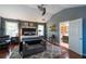 Spacious main bedroom with hardwood floors, gray walls, and ensuite bathroom access at 2928 Wintercrest Way, Atlanta, GA 30360