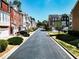 Street view of townhomes with manicured lawns, sidewalks and trees at 2928 Wintercrest Way, Atlanta, GA 30360