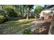 Well-maintained backyard with lush green grass and a stone paver walkway at 4233 Bonaparte Ct, Tucker, GA 30084