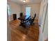 This room boasts a handsome desk and an ergonomic chair, bathed in natural light from a large window at 4233 Bonaparte Ct, Tucker, GA 30084