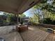 Spacious backyard wood deck with ample room for outdoor seating and entertaining at 4233 Bonaparte Ct, Tucker, GA 30084