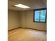Spacious bedroom featuring carpet flooring and a window for natural light at 4487 Park Place Ter, Marietta, GA 30066
