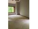 Bedroom with a window overlooking a green outdoor space at 4487 Park Place Ter, Marietta, GA 30066