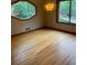 Dining room with hardwood floors, natural light, and a modern chandelier at 4487 Park Place Ter, Marietta, GA 30066