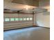 View of an empty garage with door at 4487 Park Place Ter, Marietta, GA 30066