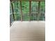 View from the screened-in porch, with a light-colored floor and lovely outdoor views at 4487 Park Place Ter, Marietta, GA 30066