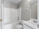 Bathroom featuring a shower/tub combo, toilet, vanity and mirror at 73 Timber Ridge Dr, Cartersville, GA 30121