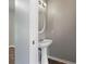 Charming powder room featuring a pedestal sink and a decorative oval mirror at 73 Timber Ridge Dr, Cartersville, GA 30121