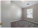 Neutral bedroom with soft carpeting and a bright window offering natural light at 73 Timber Ridge Dr, Cartersville, GA 30121