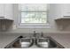 Kitchen sink featuring stainless steel hardware and a bright window at 73 Timber Ridge Dr, Cartersville, GA 30121