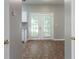 View of eat-in kitchen featuring double doors to the exterior of the house at 73 Timber Ridge Dr, Cartersville, GA 30121