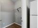 Practical laundry area with shelving, ideal for organizing cleaning supplies and laundry essentials at 73 Timber Ridge Dr, Cartersville, GA 30121