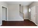 Living room featuring wood floors, a ceiling fan, staircase, and ample natural light at 73 Timber Ridge Dr, Cartersville, GA 30121