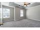 Main bedroom features a ceiling fan and two windows for lots of natural light at 73 Timber Ridge Dr, Cartersville, GA 30121