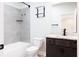 Stylish bathroom featuring a shower-tub combo, granite countertop, and modern fixtures and finishes at 1110 Bakary Ct, Decatur, GA 30032
