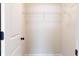 Walk-in closet with a single wire rack for hanging clothes at 1110 Bakary Ct, Decatur, GA 30032