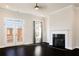 Bright living room featuring a fireplace and glass paneled doors to the patio at 1110 Bakary Ct, Decatur, GA 30032