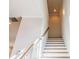 Bright and airy staircase with wooden handrail and white risers at 1110 Bakary Ct, Decatur, GA 30032