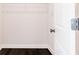 Spacious walk-in closet with dark wood floors and ample storage space at 1110 Bakary Ct, Decatur, GA 30032