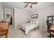 Comfortable bedroom with ceiling fan, large window, and desk at 1647 Sabastian Ne Pt, Atlanta, GA 30329