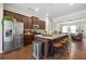 Well-appointed kitchen features an island with seating, stainless steel appliances, and ample cabinet space at 1647 Sabastian Ne Pt, Atlanta, GA 30329