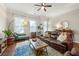 Inviting living room features hardwood floors, neutral walls, and large windows for abundant natural light at 1647 Sabastian Ne Pt, Atlanta, GA 30329