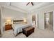 Main bedroom with ceiling fan, tray ceiling, walk-in closet and ensuite bathroom at 1647 Sabastian Ne Pt, Atlanta, GA 30329