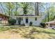 Charming one-story home with well-maintained lawn, landscaping, and a brick accent wall in a quiet neighborhood at 2240 Polar Rock Sw Ave, Atlanta, GA 30315